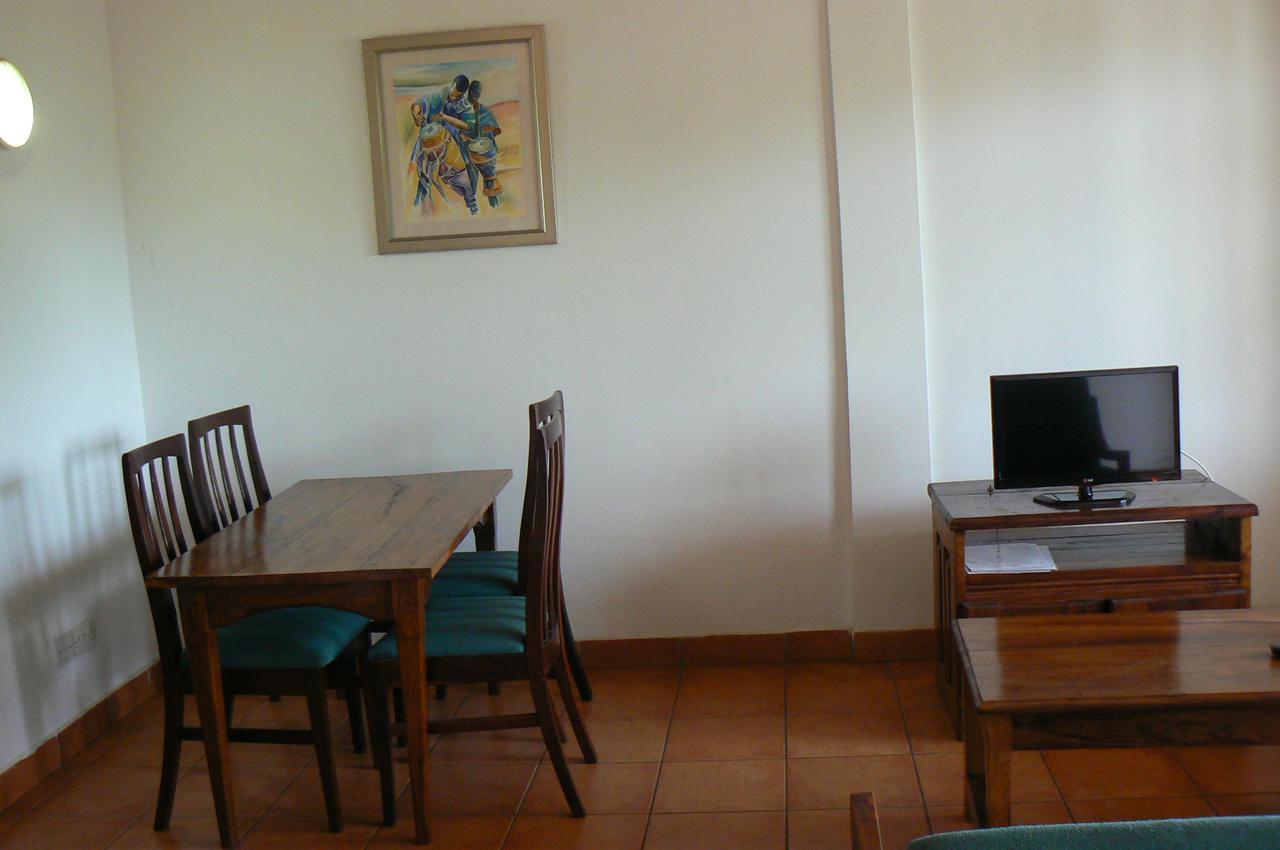 Riyan Apartment Кололи Экстерьер фото